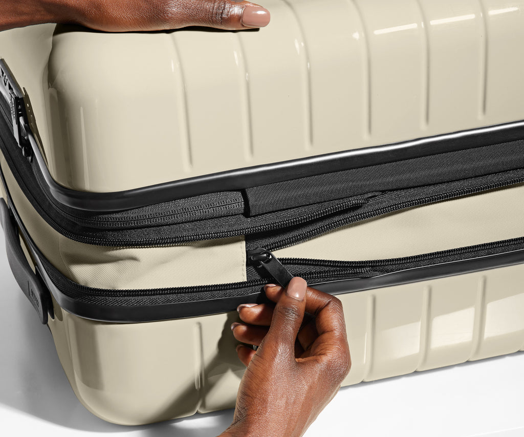 The Bigger Carry-On Flex in Salt White (Gloss)