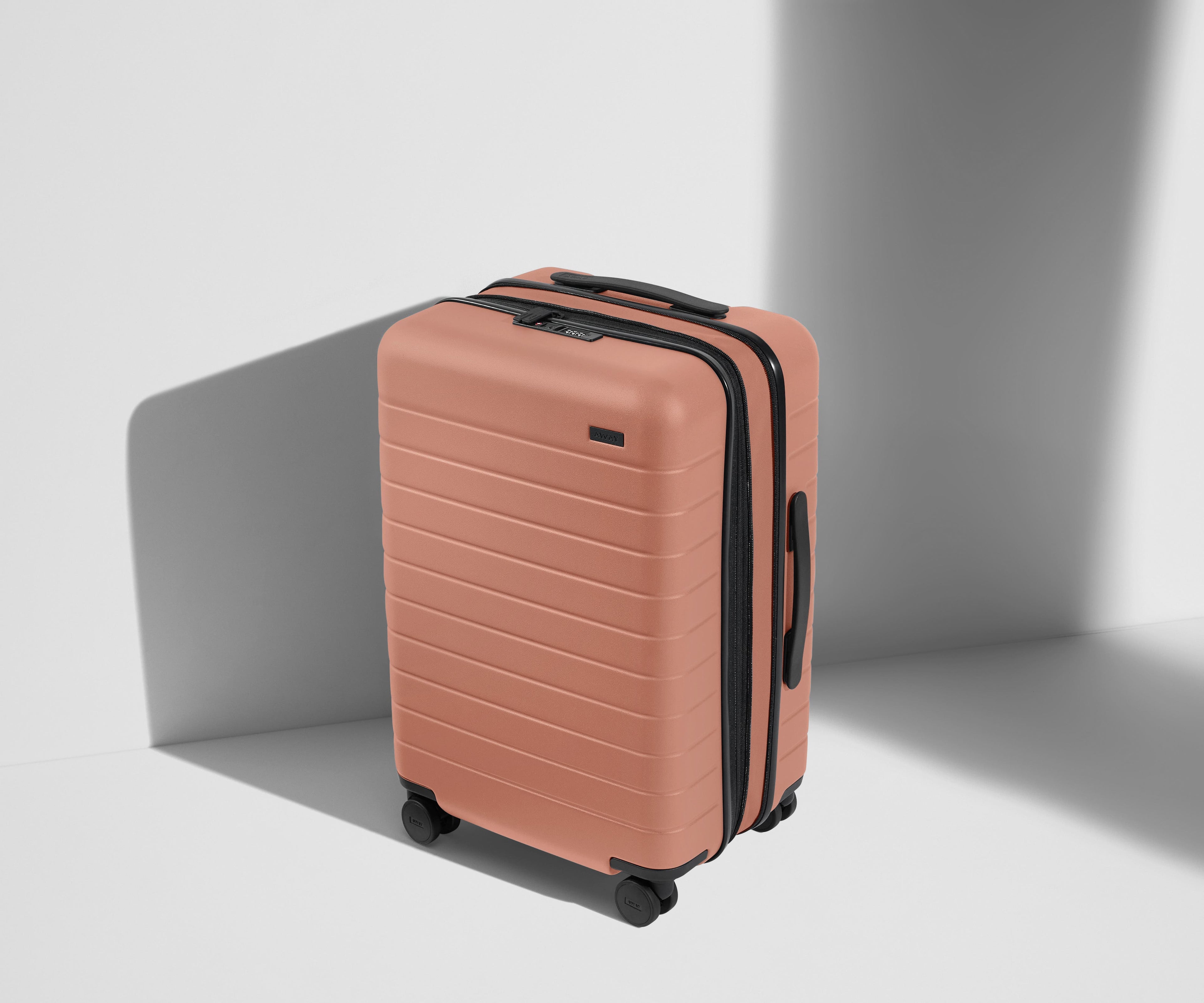 The Bigger Carry-On Flex in Clay Pink