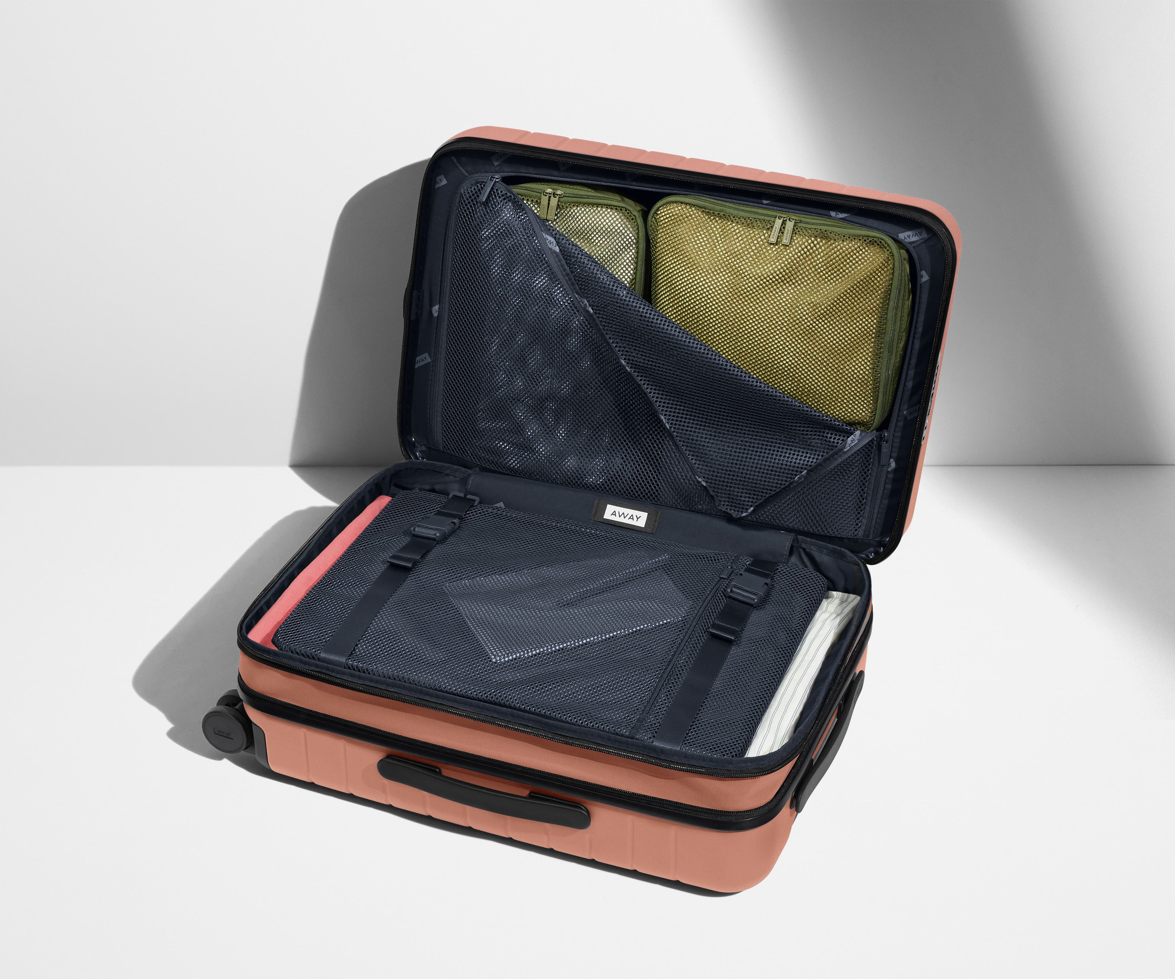 The Bigger Carry-On Flex in Clay Pink