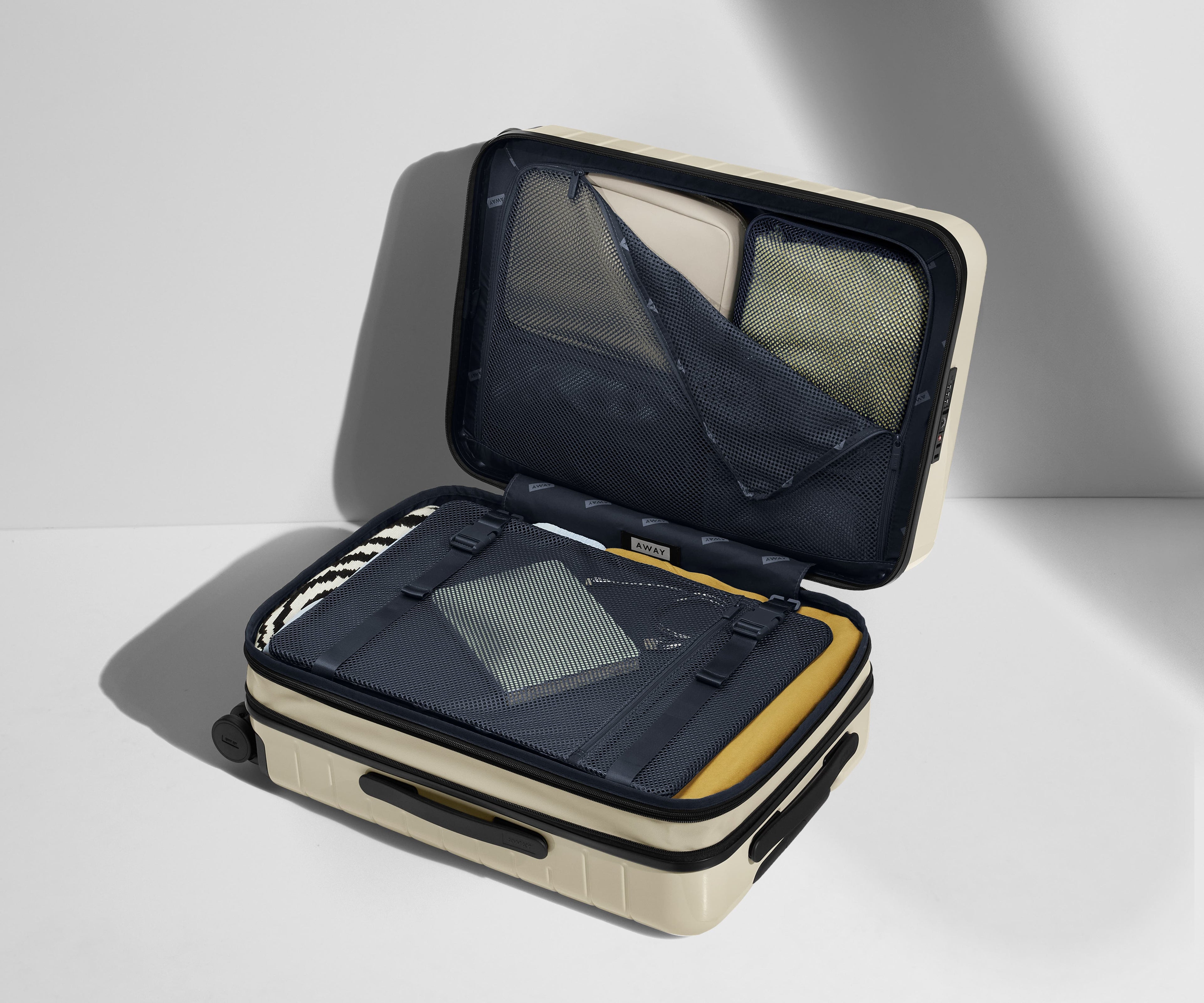 The Bigger Carry-On Flex in Salt White (Gloss)