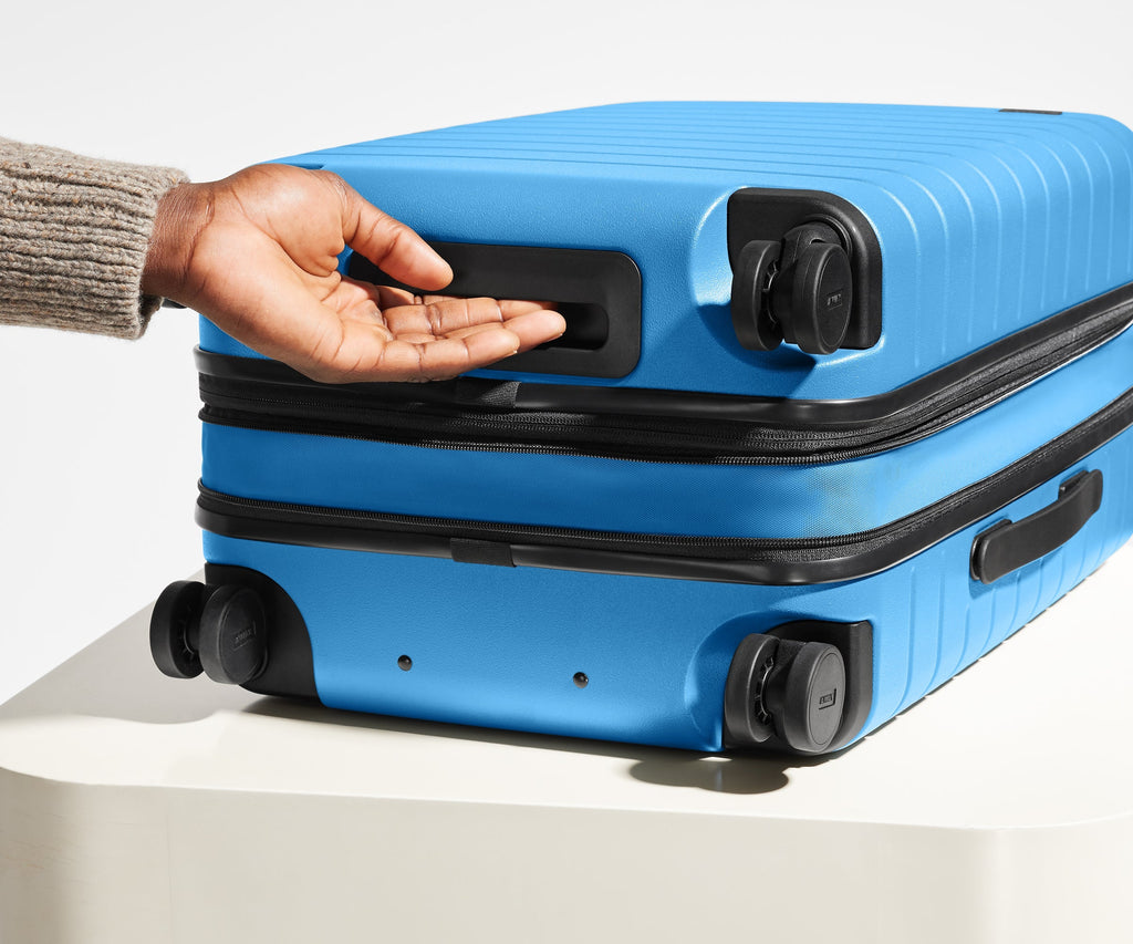 The Bigger Carry-On Flex in Splash Blue