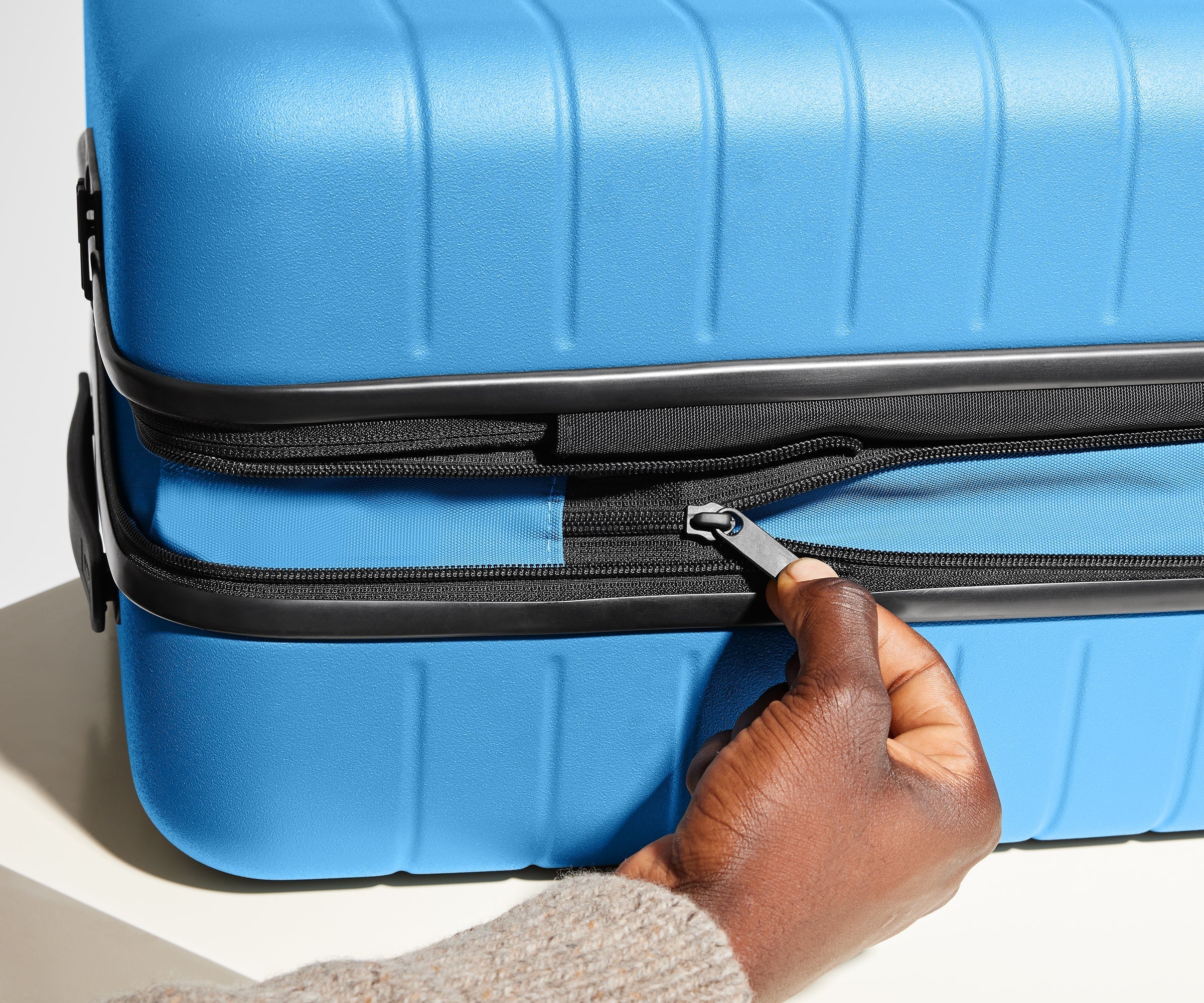 The Bigger Carry-On Flex in Splash Blue
