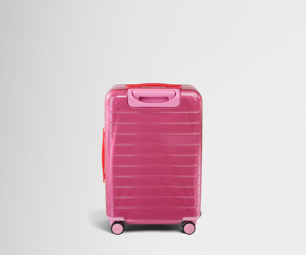 The Bigger Carry-On in Translucent Pink