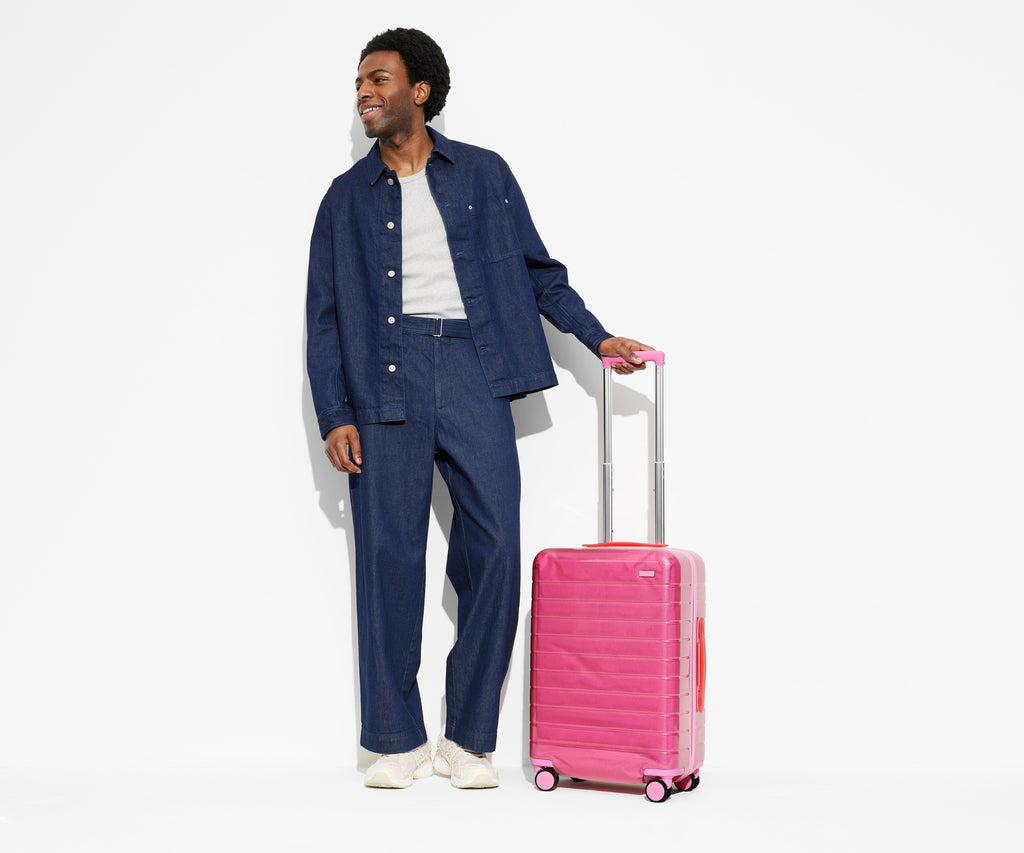 The Bigger Carry-On in Translucent Pink